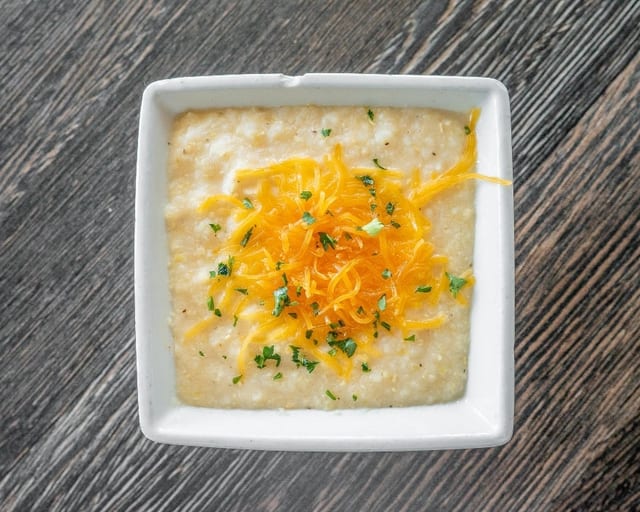 STONE-GROUND CHEDDA CHEESE GRITS.